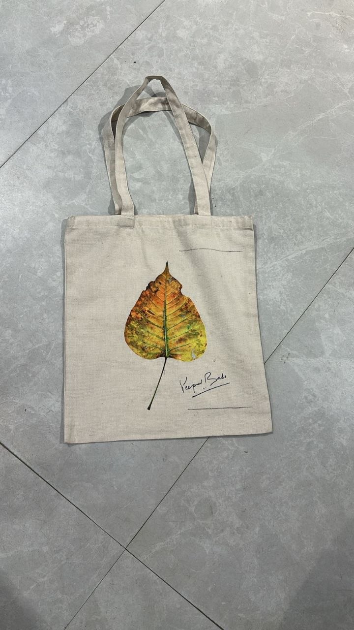 Designer customised canvas tote bag with printed leaf artwork
